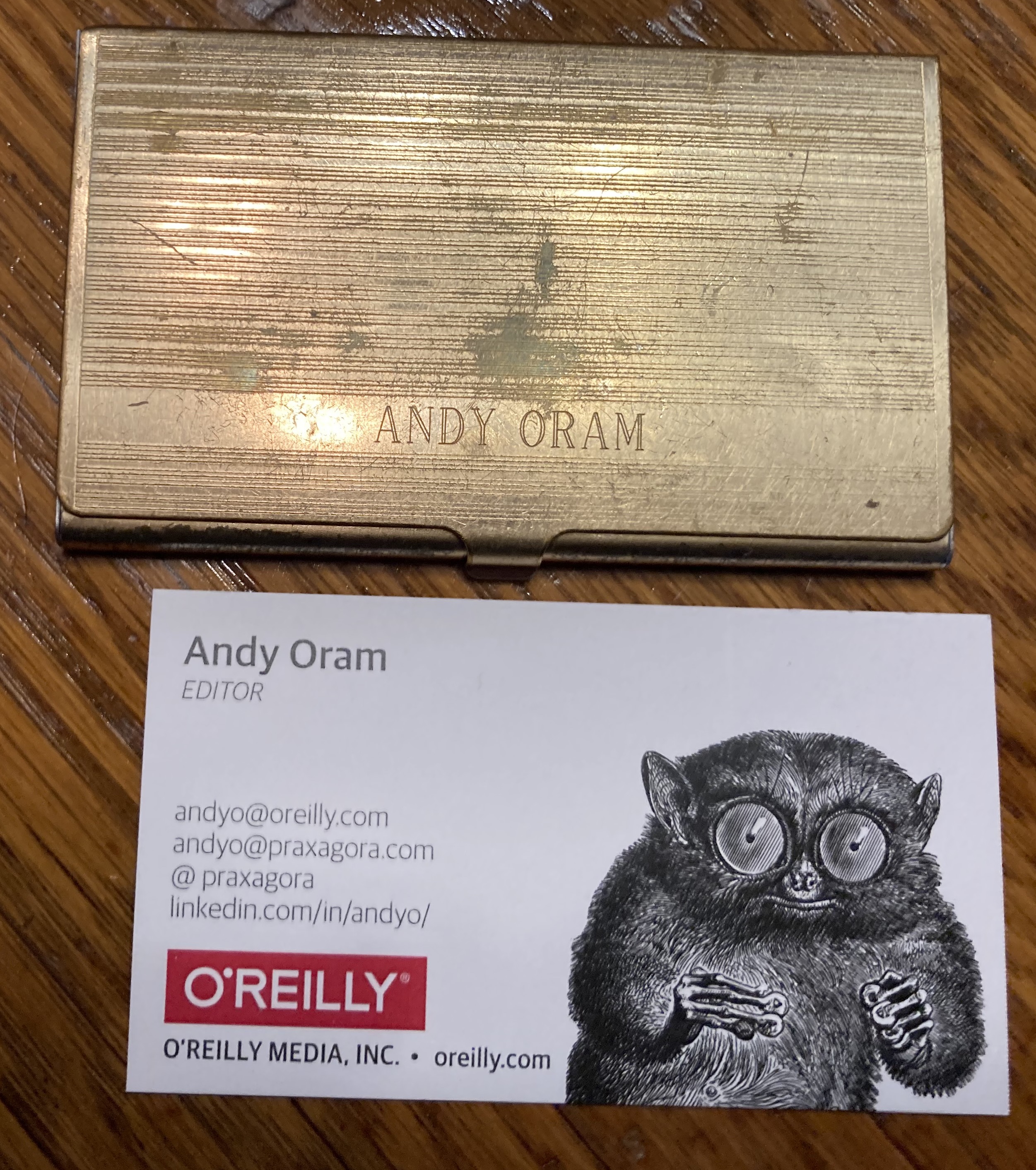 Photo of a typical O'/Reilly business card and my personalized card case