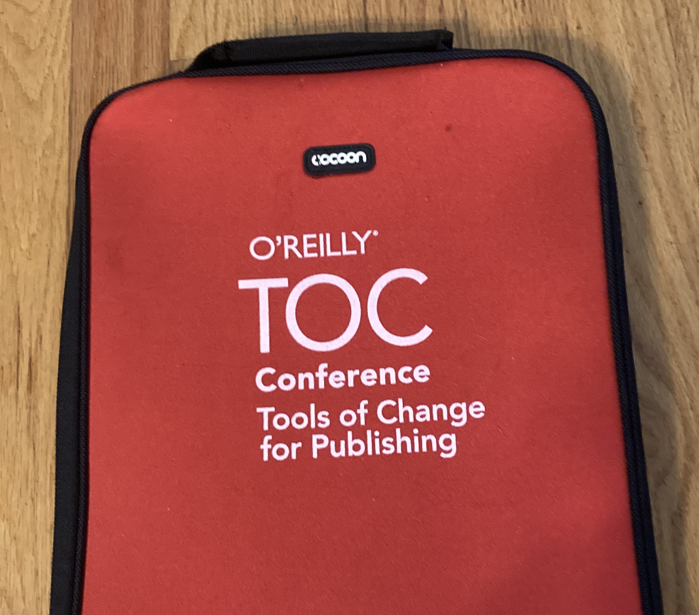 Laptop case given out as swag at a Tools of Change conference