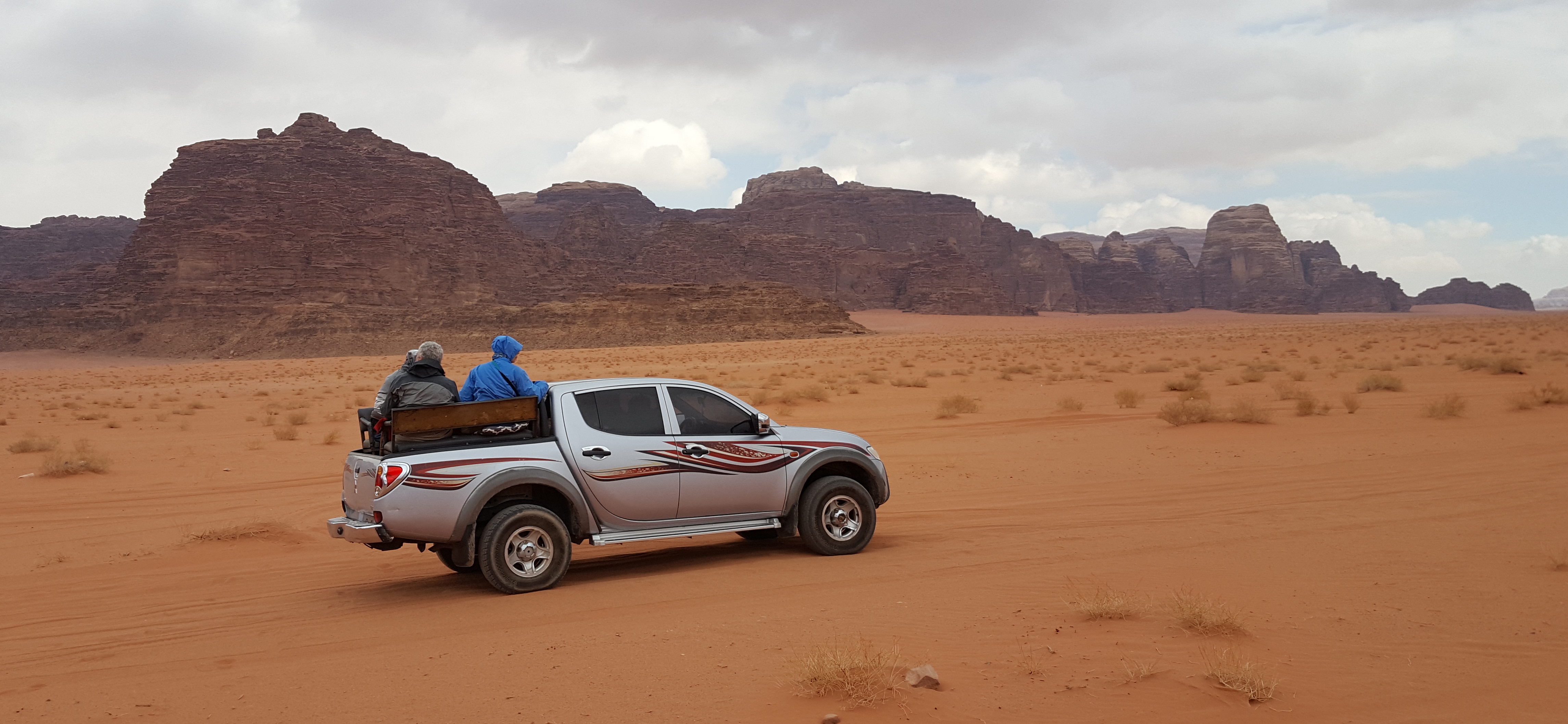 [Photograph of Wadi Rum desert]